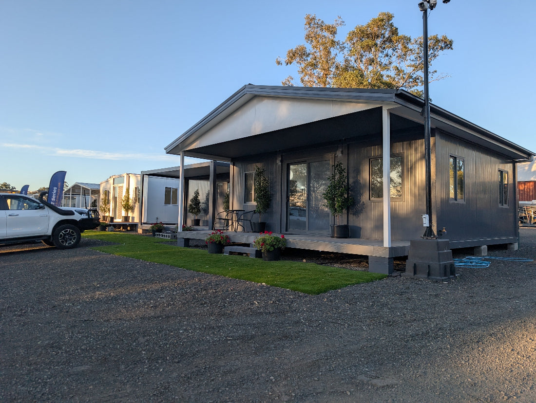 modular container home, backyard granny flat, expandable tiny house, self-contained living pod, off-grid portable retreat, portable site office, prefab office pod, modular workspace unit, compact backyard office, container office setup, site shed solution, transportable lunchroom, mobile site storage, tradie crib room, modular site amenities building, towable bathroom unit, portable ensuite with shower, construction toilet pod, mobile, eco-friendly bathroom solution, slimline water tank, utility shed
